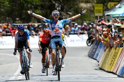 Oscar Onley celebrates as he wins stage five of the 2024 Tour Down Under