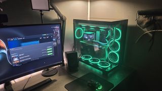 A gaming PC with RGB lighting enabled on a desk.