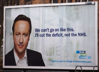 EDINBURGH, UNITED KINGDOM - JANUARY 25:A billboard poster of Conservative party leader David Cameron is vandalised on January 25, 2010 in Edinburgh, Scotland.The Conservatives admitted that t