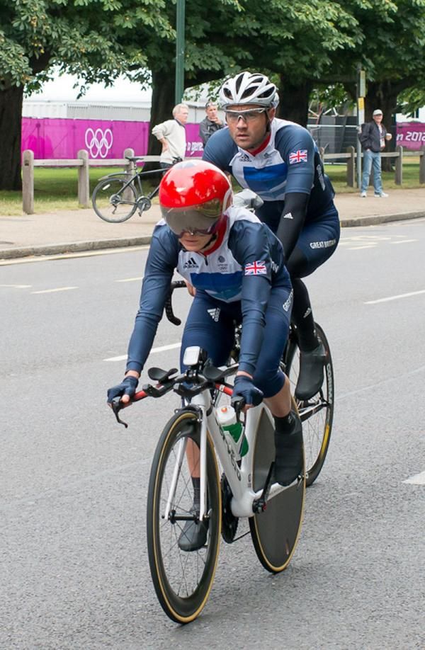 Team GB coach Chris Newton and Emma Pooley head out onto the roads