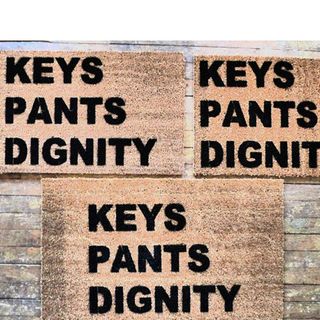 brown doormat with text keys pants dignity