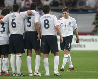 Gerrard makes the lonely walk back after failing to score his penalty during a World Cup quarter-final clash with Portugal at the 2006 World Cup