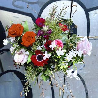 Rebel Rebel bouquet with pink orange and white flowers