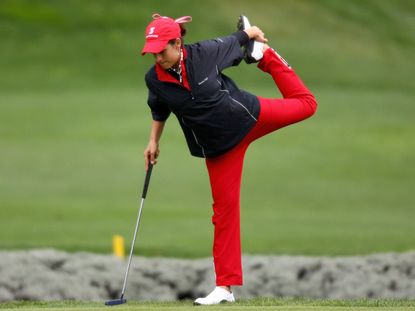Golfer stretching