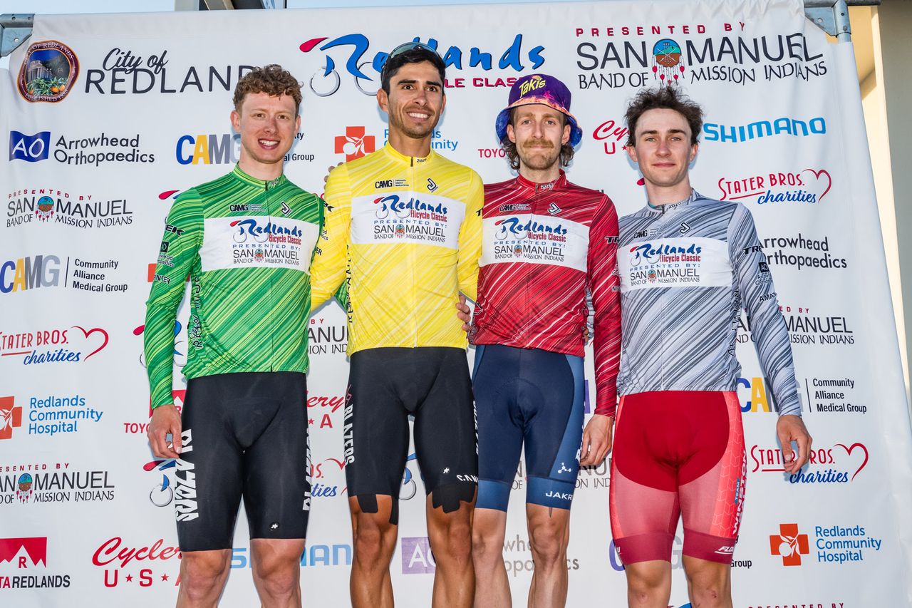 GC men's podium with Eder Frayer in the yellow leader's jersey as GC winner