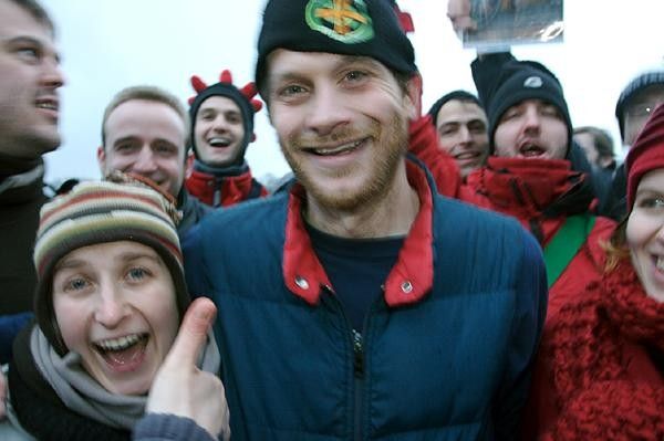 Erik Tonkin (Kona) smiles while hanging out with his fan club after racing at St. Niklaas.