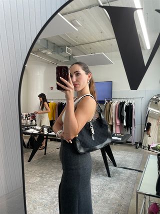 Anna LaPlaca wearing a black Gucci Jackie shoulder bag from Vestiaire Collective.