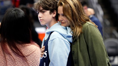 Alicia Silverstone and her son, Bear Blu, attend a basketball game between the Los Angeles Clippers and Houston Rockets at Crypto.com Arena on November 17, 2023 in Los Angeles, California