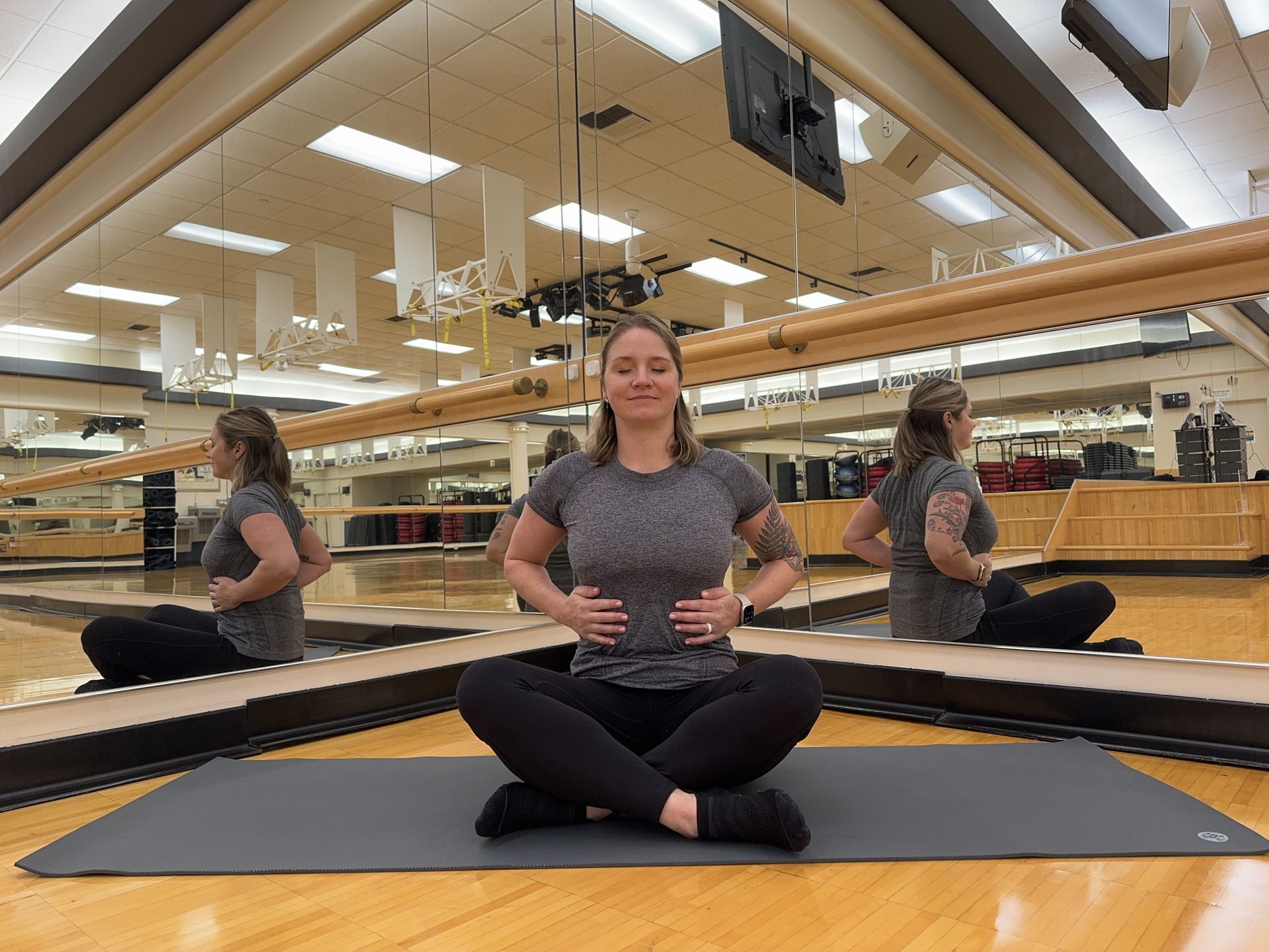 Balanced Body's Staci Alden demonstrating seated breathing