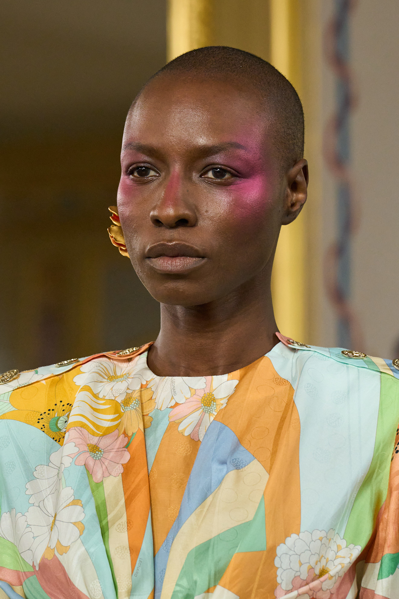 A model at the Leonard spring-summer 26 show wearing draped blush.