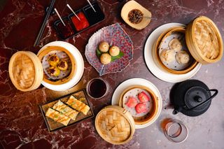 An image showing food on the table at the Chinese Cricket Club restaurant