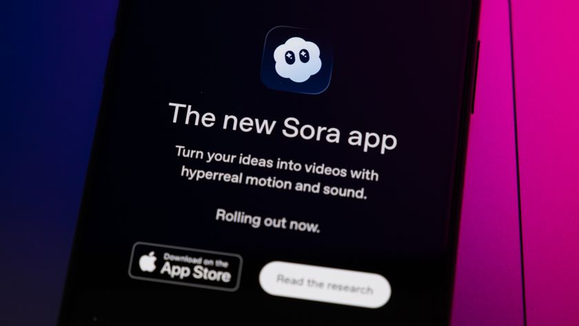 The Sora App home page displays on a smartphone screen placed on a computer keyboard illuminated by blue and purple light.