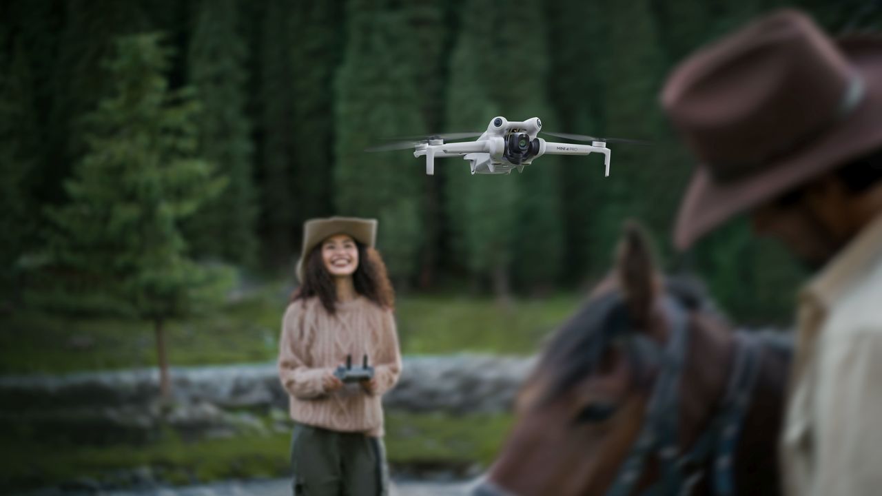 The DJI Mini 4 Pro in use in a forest, with a cowboy on a horse in the foreground