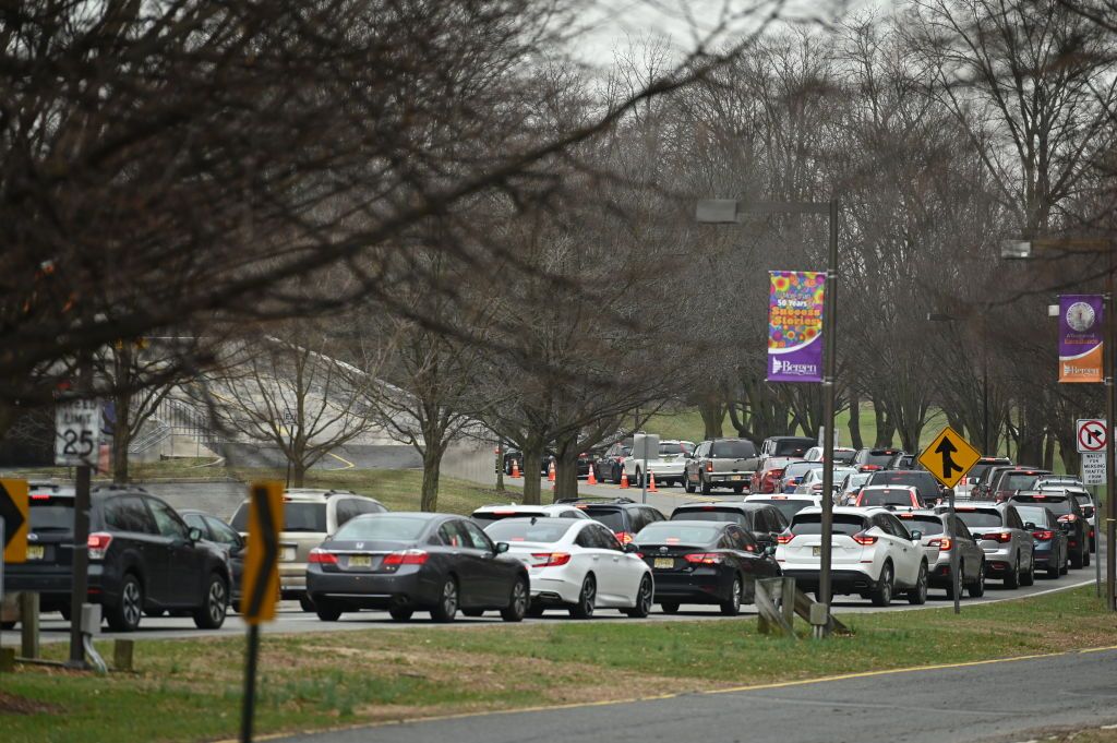 People wait to get tested for COVID-19 in New Jersey.