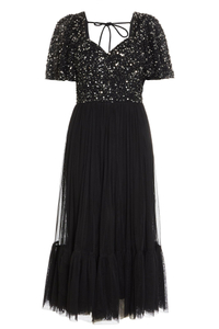 Quiz Clothing Black Sequin V Neck Midi Dress | $125.99/£89.99
An LBD with a twist, this black midi dress with a tulle skirt and sequined top is perfect to wear to any New Year's Eve event—including weddings. 