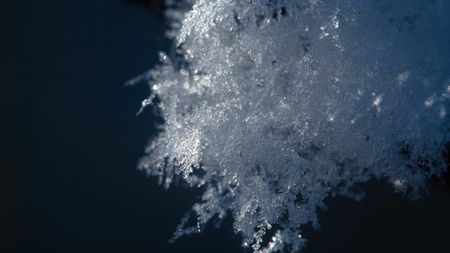 Macro ice crystal growth illustrating chaotic surface formation described by the KPZ equation.