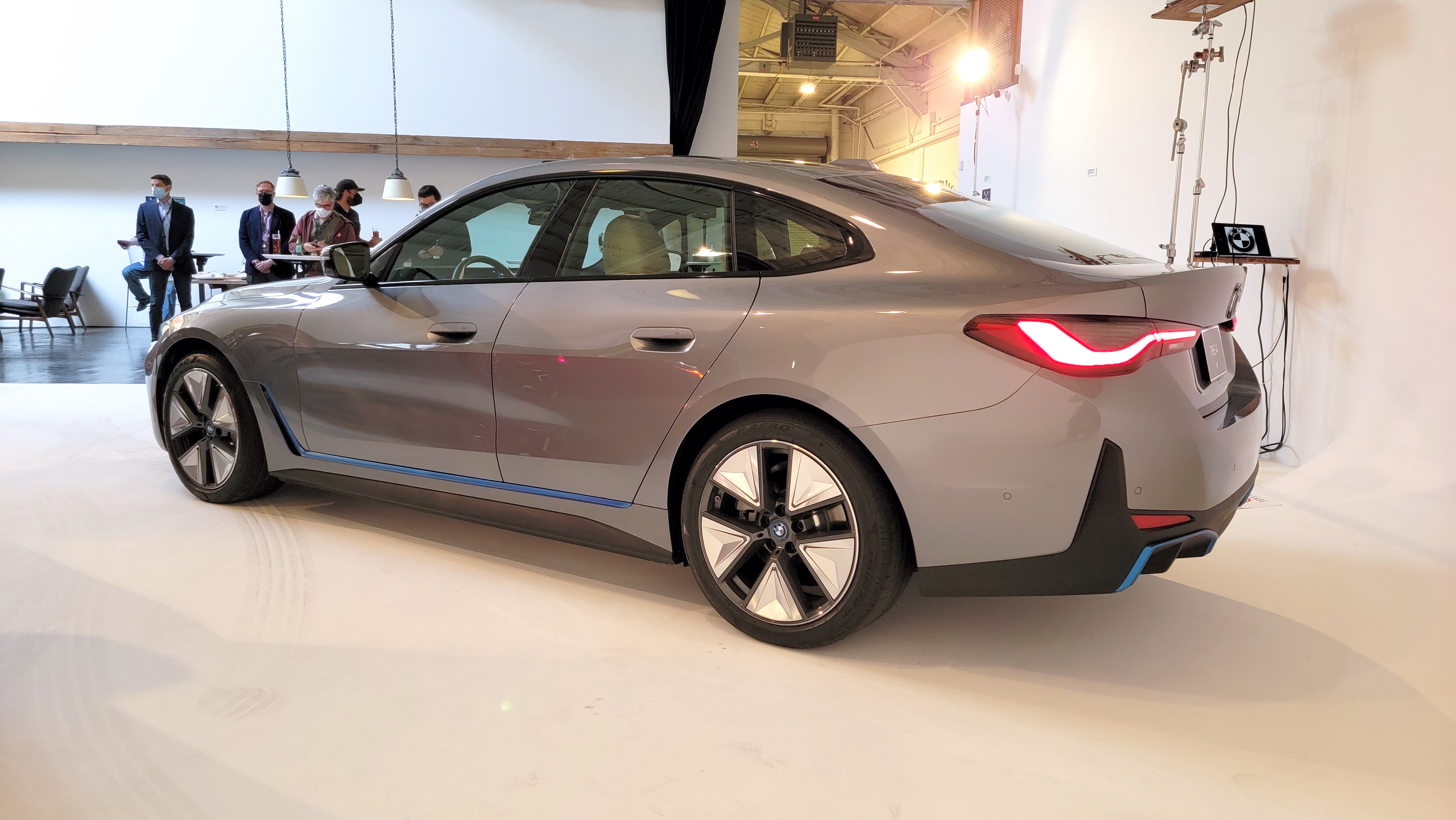 Side profile of a car in a showroom