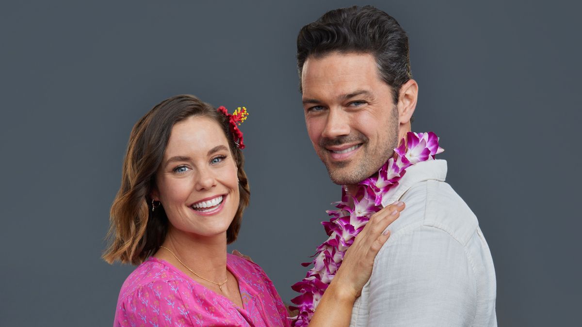 Ashley Williams and Ryan Paevey in a promotional photo for Hallmark&#039;s Two Tickets to Paradise