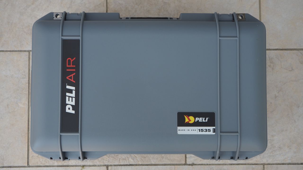 Peli 1535 Air case in grey on a flagstone floor