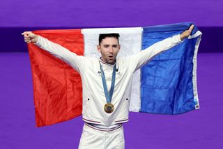 PARIS FRANCE AUGUST 08 Gold medalist Benjamin Thomas of Team France celebrates at podium after the Mens Omnium Points Race 44 on day thirteen of the Olympic Games Paris 2024 at SaintQuentinenYvelines Velodrome on August 08 2024 in Paris France Photo by Tim de WaeleGetty Images