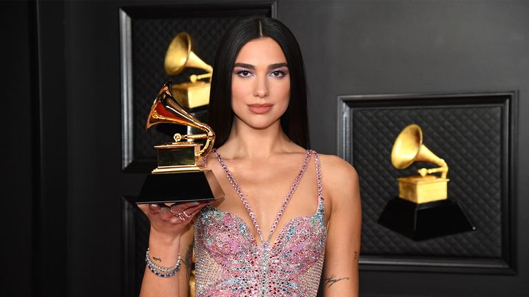 LOS ANGELES, CALIFORNIA - MARCH 14: Dua Lipa, winner of Best Pop Vocal Album for ‘Future Nostalgia’, poses in the media room during the 63rd Annual GRAMMY Awards at Los Angeles Convention Center on March 14, 2021 in Los Angeles, California. (Photo by Kevin Mazur/Getty Images for The Recording Academy )