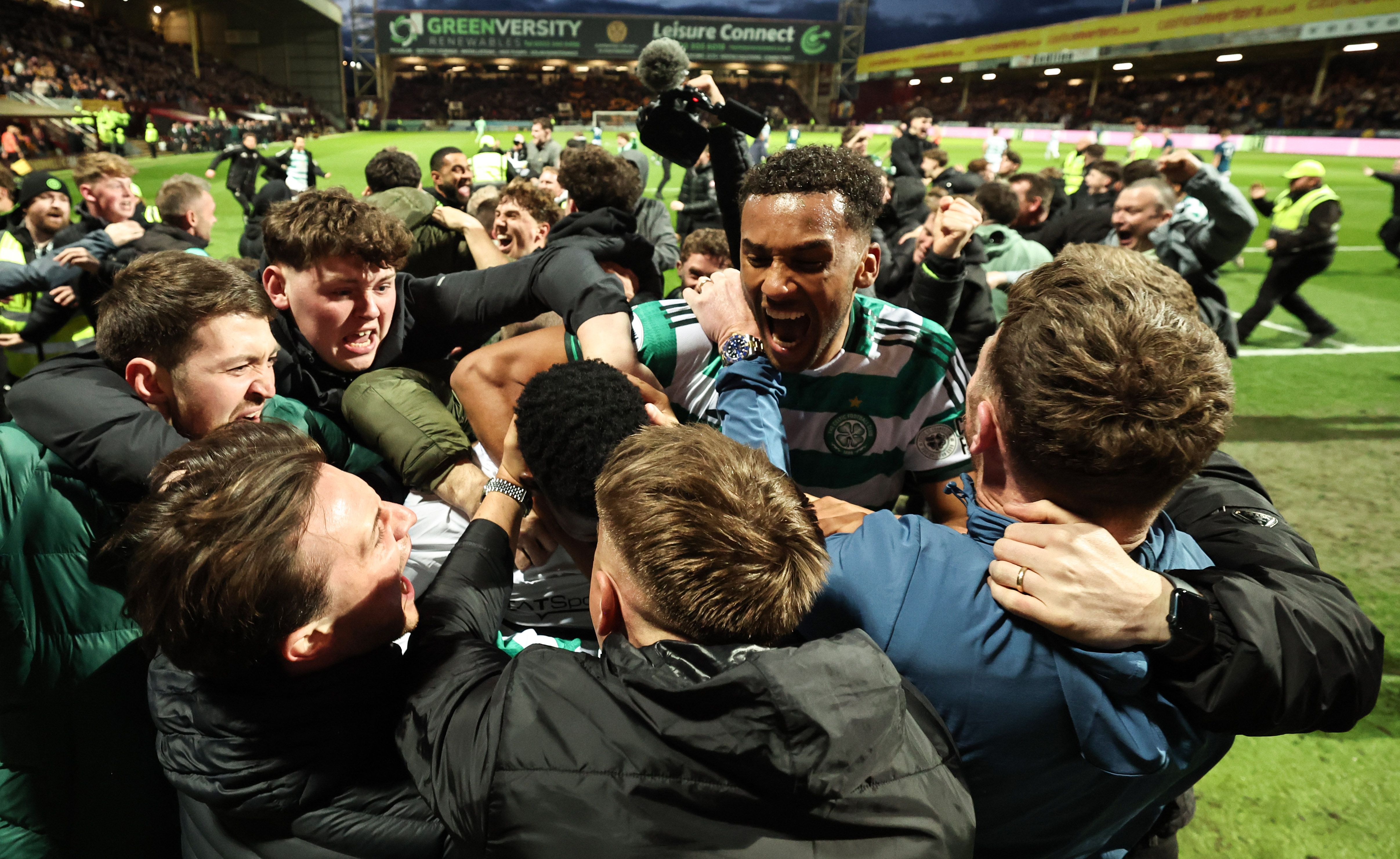 MOTHERWELL, SCOTLAND - MAY 13: Celtic's Auston Trusty celebrates with fans after Kelechi Iheanacho scores a penalty to make it 3-2 during a William Hill Premiership match between Motherwell and Celtic at Fir Park, on May 13, 2026, in Motherwell, Scotland. (Photo by Ross MacDonald/SNS Group via Getty Images)