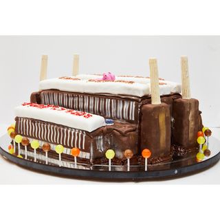chocolate cake with lollipop sticks