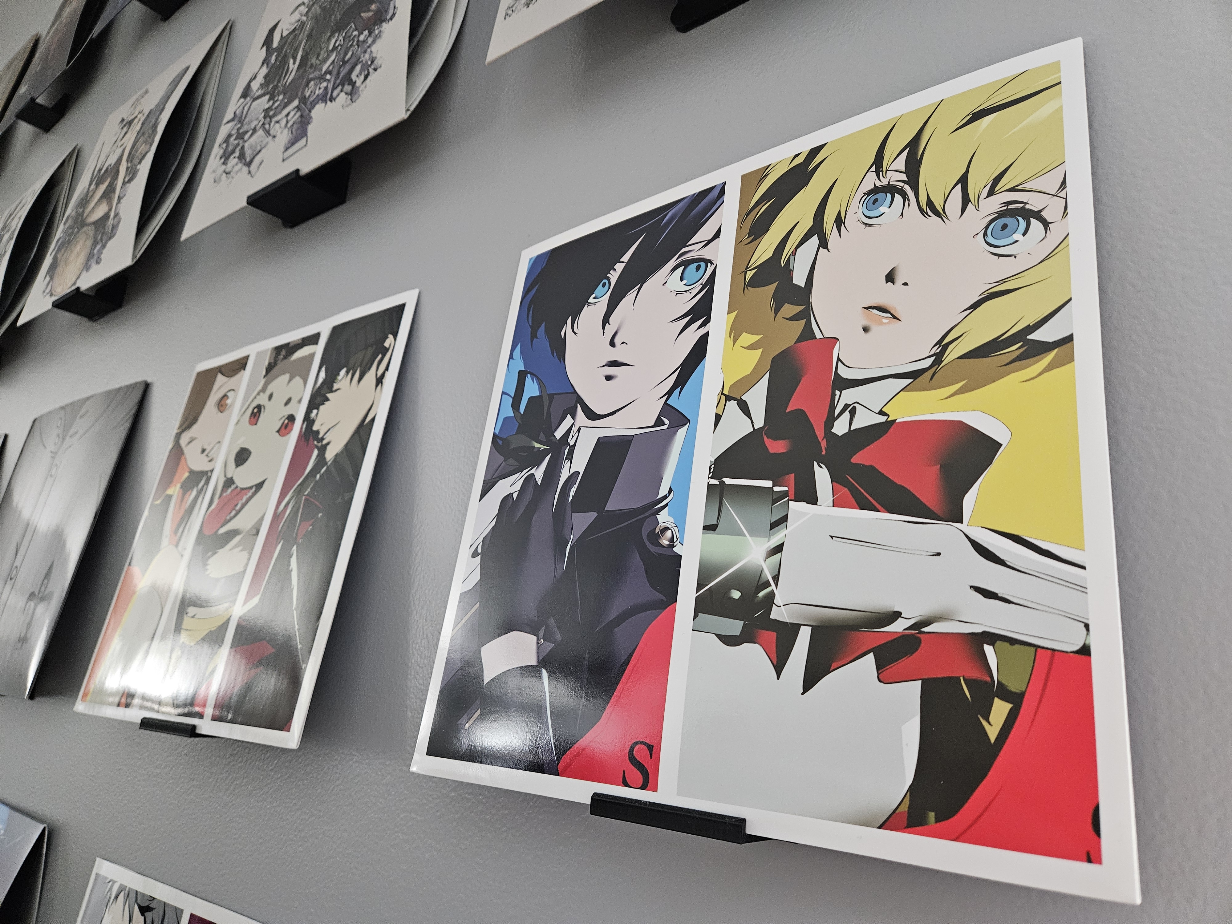 Persona 3 Reload vinyl records on gray wall
