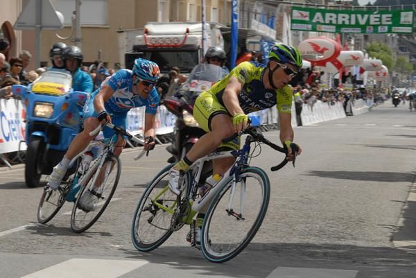 Jean Luc Delpech corners ahead of Sebastien Turgot.