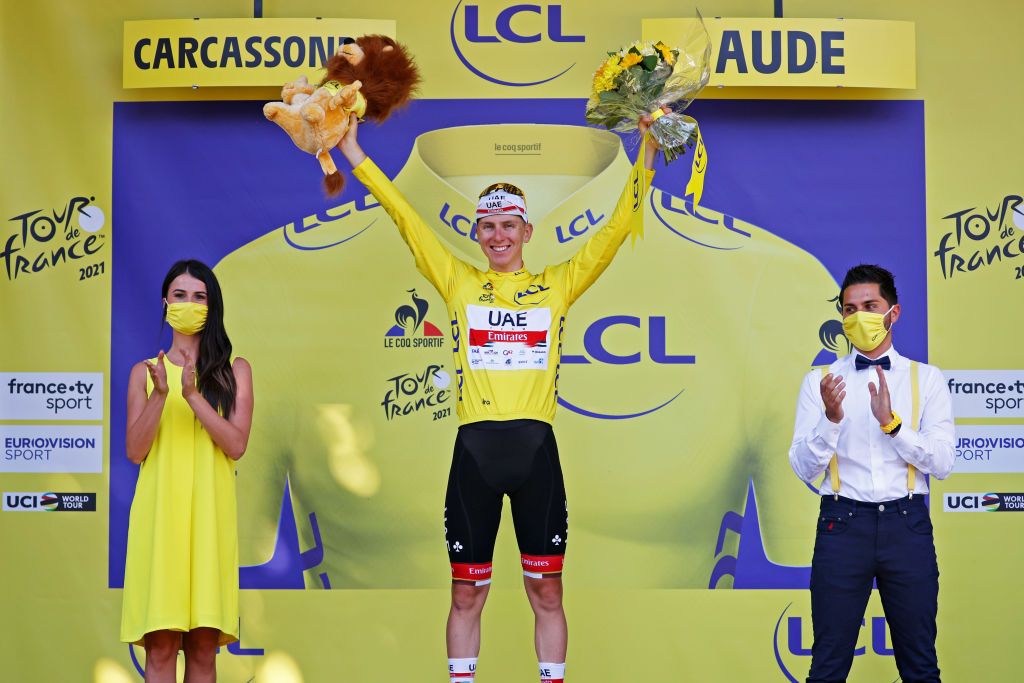 CARCASSONNE FRANCE JULY 09 Tadej Pogaar of Slovenia and UAETeam Emirates Yellow Leader Jersey celebrates at podium during the 108th Tour de France 2021 Stage 13 a 2199km stage from Nmes to Carcassonne Lion Mascot LeTour TDF2021 on July 09 2021 in Carcassonne France Photo by Chris GraythenGetty Images