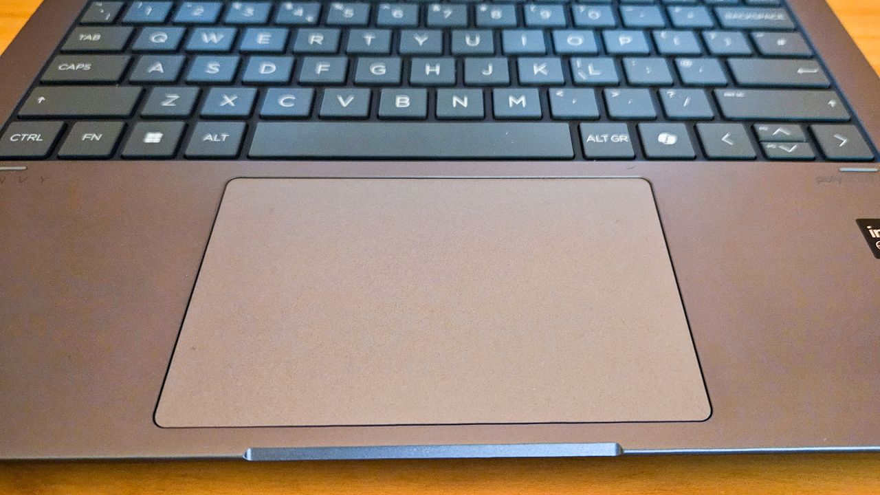HP Envy x360 14 laptop on table.
