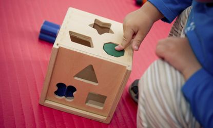 Kid solving puzzle