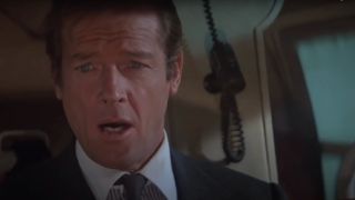 Roger Moore talks as he flies a helicopter in For Your Eyes Only.