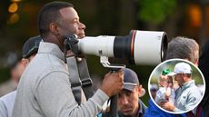 Ken Griffey Jr holds a camera