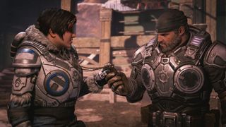 Two characters inspect some dog tags in Gears 5