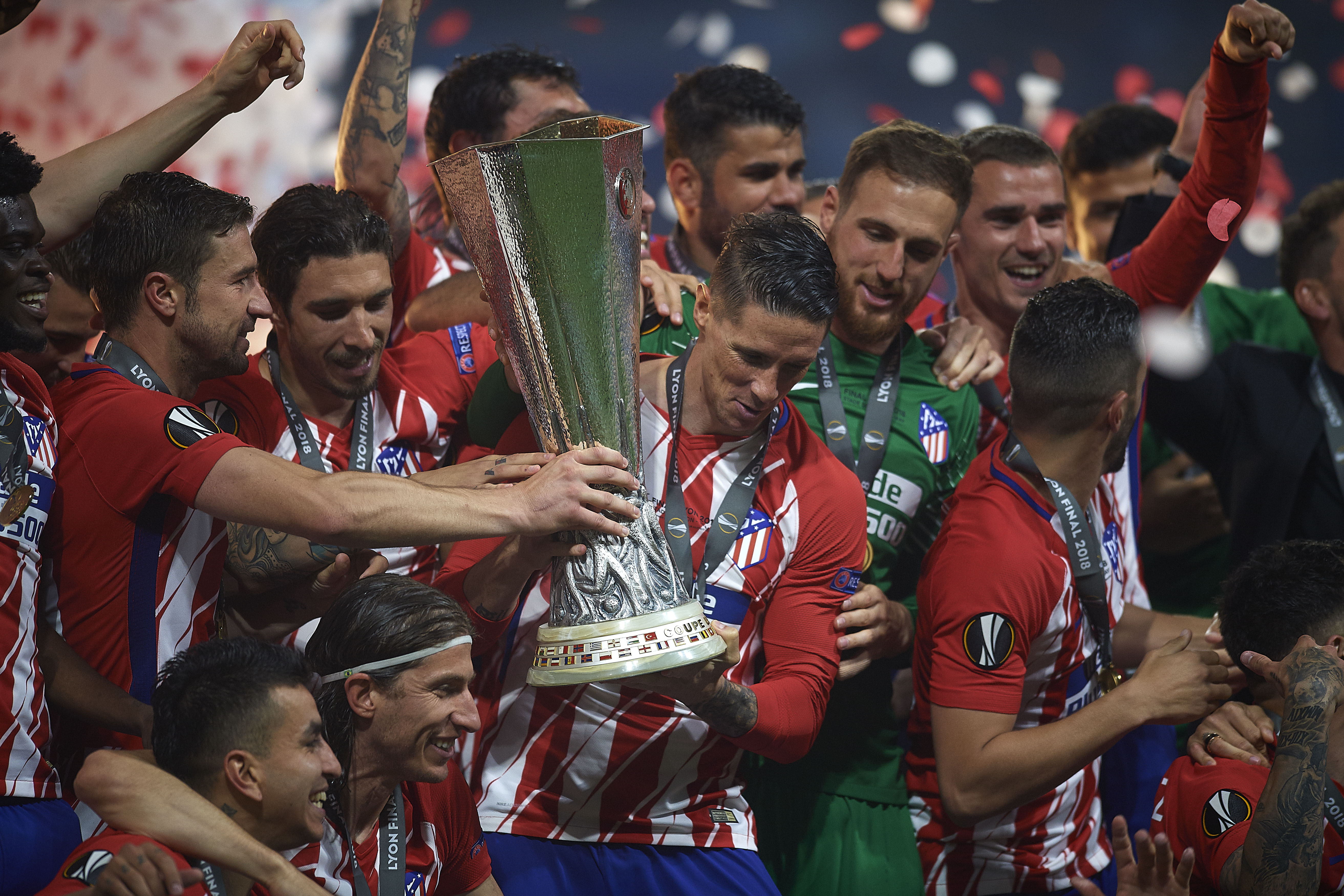 Atletico Madrid players celebrate with the Europa league trophy after victory over Olympique Marseille in the final in May 2018.