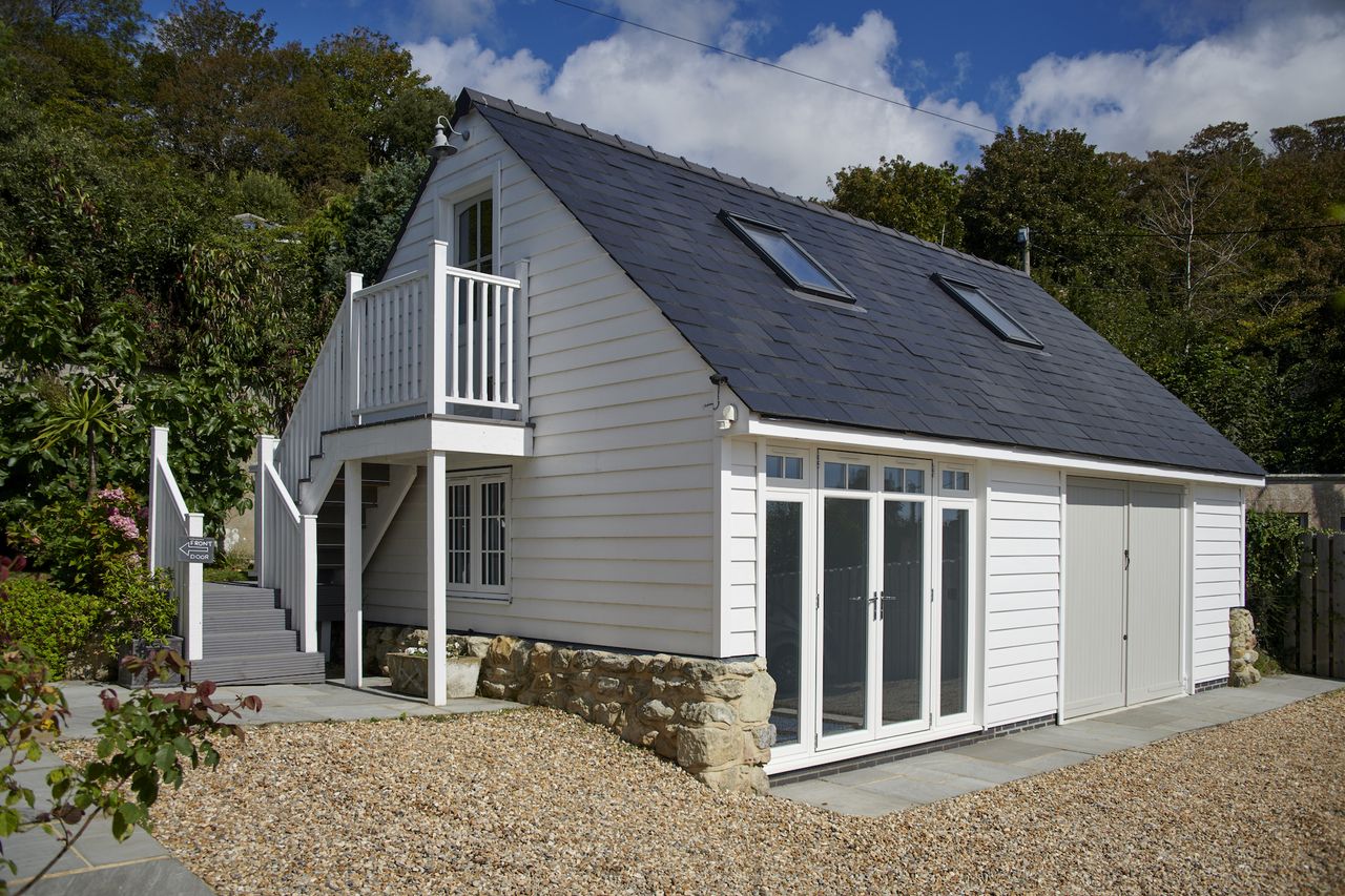 white cladding on large garage