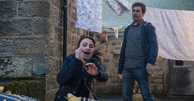 Cain Dingle finds Emma Barton in Holly’s room and orders her out but she just ignores him. He’s certain she’s up to no good and drags her outside. Shocked Moira Dingle reveals she had asked Emma to pack up Holly’s clothes and Cain realises he’s been played and is forced to walk away in Emmerdale.