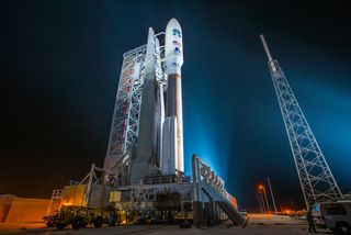 The United Launch Alliance Atlas V rocket carrying the GOES-R weather satellite stands atop its launchpad, bathed in light, ahead of its Nov. 19, 2016 launch from Cape Canaveral Air Force Station, Florida.