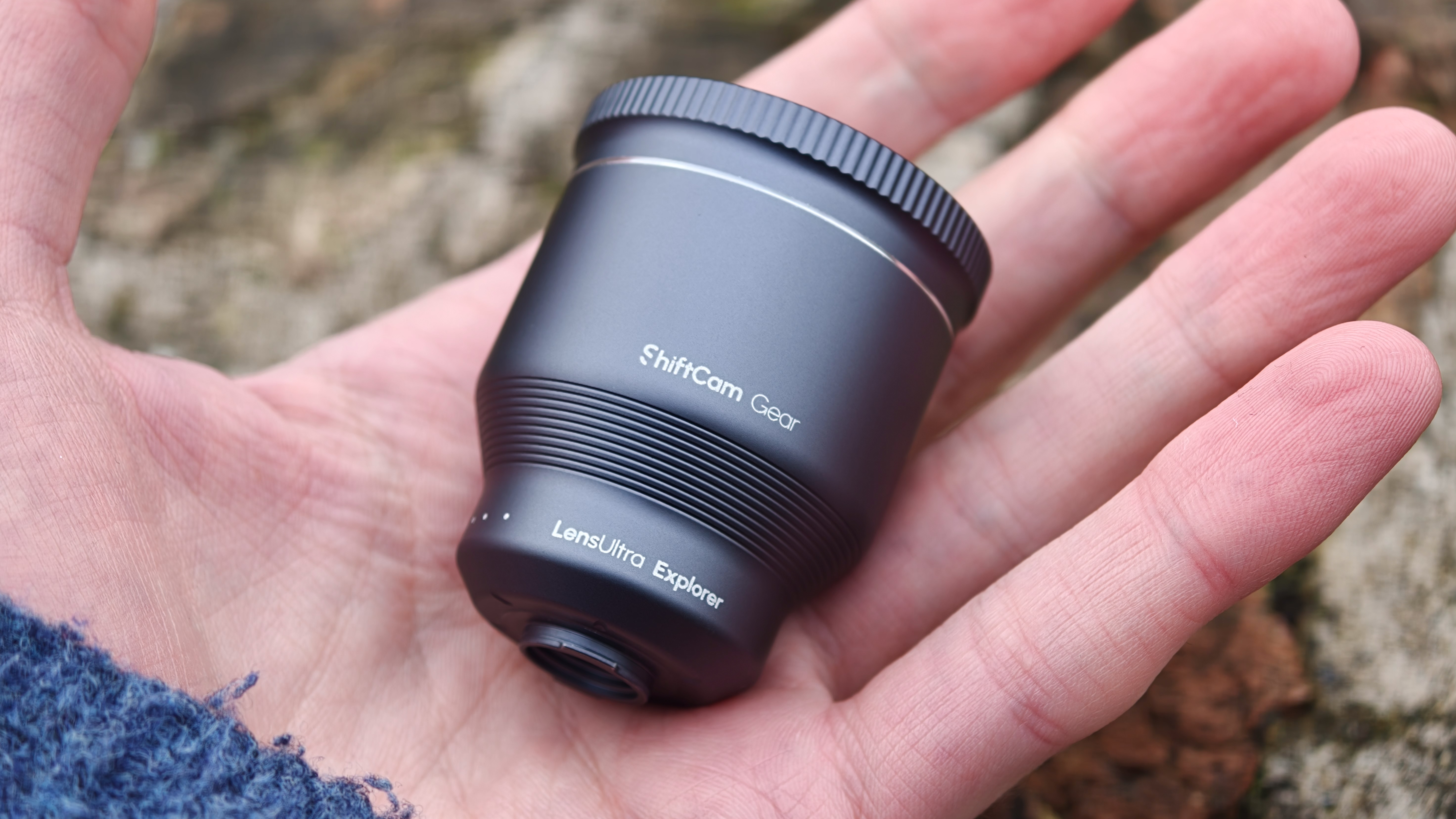 ShiftCam LensUltra Explorer Super Zoom Tele 240mm lens held in a hand