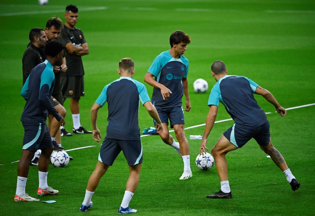 Barcelona&#039;s Portuguese forward #14 Joao Felix (C) attends a training session at the Dragao stadium in Porto, on October 3, 2023, on the eve of the UEFA Champions League 1st round day 2 group H football match between FC Porto and FC Barcelona.