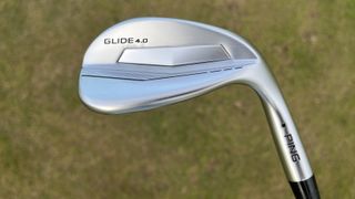 Ping Glide 4.0 Wedge and its very sleek clubhead resting on the golf course