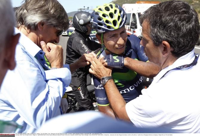 Nairo Quintana (Movistar) has his shoulder checked before abandoning the race