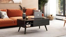 Living room with orange sofa and brown wooden coffee table