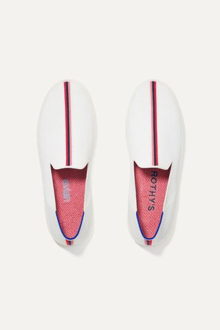 white slip-on shoes with blue, red, and pink stripes