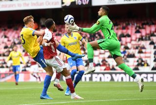 Brighton and Hove Albion goalkeeper Robert Sanchez makes a save during the Premier League match at the Emirates Stadium, London. Picture date: Sunday May 23, 2021