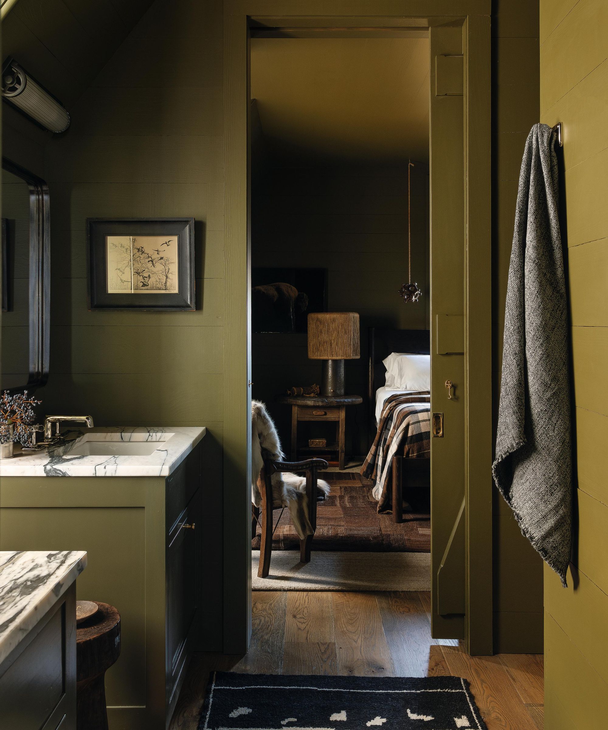 a jewel box green powder bathroom in a moody farmhouse home