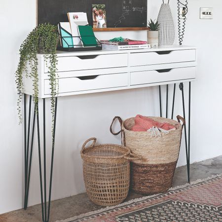 An IKEA console table with hairpin legs