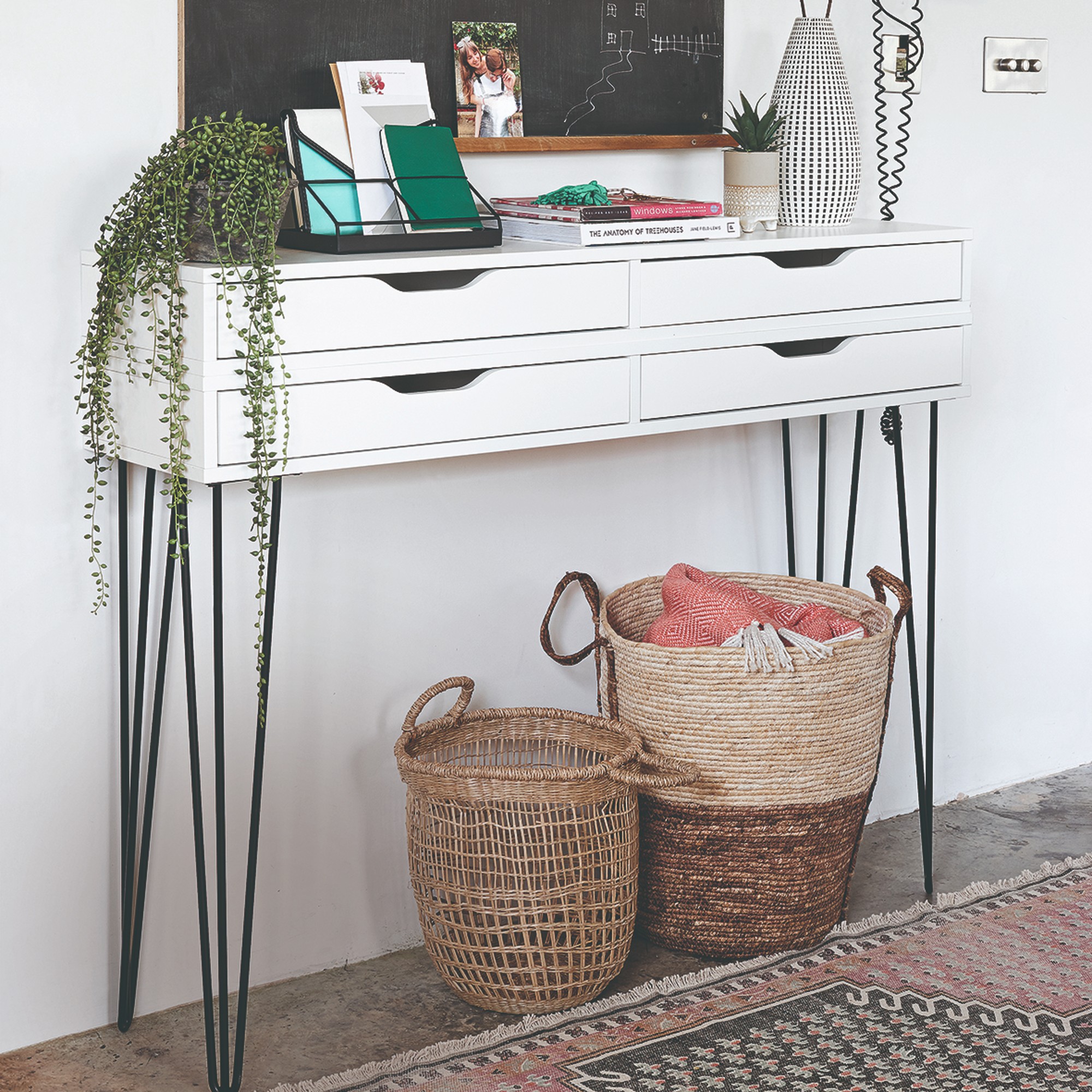 An IKEA console table with hairpin legs