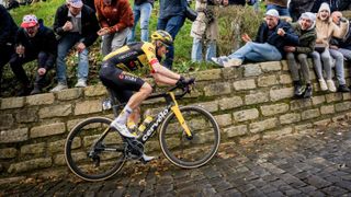 Dutch rider Dylan Van Baarle of Jumbo-Visma rising up a cobbled road ahead of the 79th edition of the men's one-day cycling race Omloop Het Nieuwsblad 2024